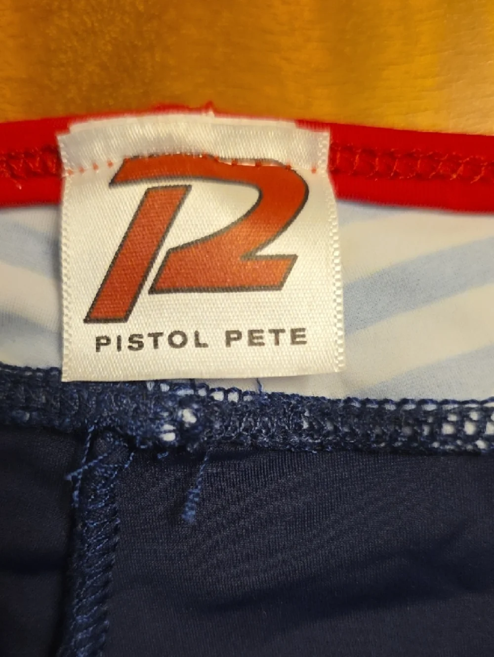 Men's Navy Swim Trunks with Red Trim and White Stripe Detail UNIQUE V CUT OUT - Picture 3 of 5